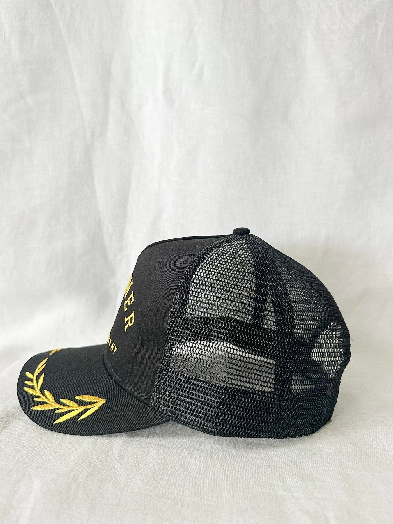 Black & Gold Trucker